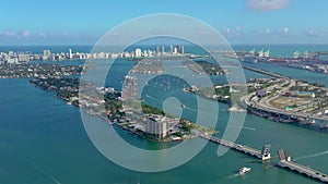 MIAMI, FLORIDA, USA - JANUARY 2019: Aerial drone view flight over Miami sea port. Ships and cruise liners at the pier.