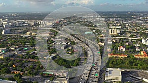 MIAMI, FLORIDA, USA - MAY 2019: Aerial drone view flight over Miami downtown. Road viaduct and overpass from above.