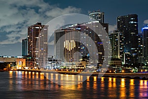 Miami night downtown, city Florida. Miami Florida at sunset, skyline of illuminated buildings and Macarthur Causeway