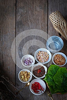 Miang kham,A royal leaf wrap appetizer Consist of Shallot, Ginger, Fried beans, Slice of lemon, Betel leaf, Chilli, Fried coconut