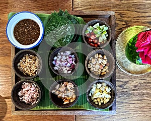 Miang kham, Thai snack set which Leaf-Wrapped Bite-Size Appetizer