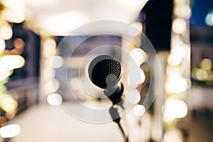 MIC ON A STAGE READY FOR THE SINGER OR SPEAKER