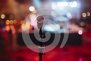 MIC ON A STAGE READY FOR THE SINGER OR SPEAKER