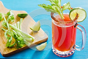 Michelada beer with tomato juice, spicy sauce and lemon, mexican drink cocktail in mexico photo