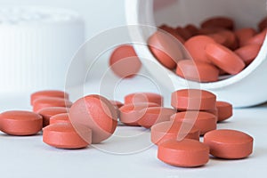 Ibuprofen Tablets Spilled from a the Bottle