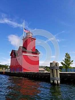 Michigan lighthouse with half mast flag