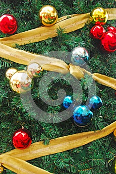 Mickey mouse shaped ornaments as Christmas Tree Decoration with gold golden ribbon photo