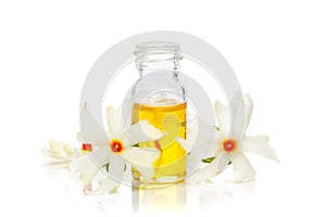 Micro close-up of Essential Oil or Attar, Fragrance Oil, Perfume oil in mini transparent glass bottle of orange small night