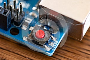 Micro controller close-up, RESET button detail. Open source microcontroller for DIY projects. Stem activities with electronics