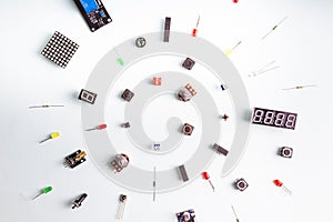Micro electronics arduino DIY components on a light background, top view