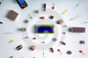 Micro electronics arduino DIY components on a light background, top view