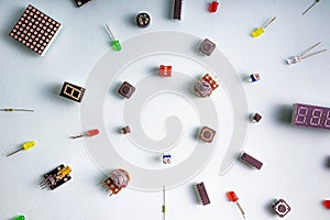 Micro electronics arduino DIY components on a light background, top view