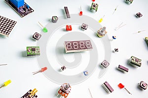 Micro electronics arduino DIY components on a light background, top view