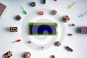 Micro electronics arduino DIY components on a light background, top view
