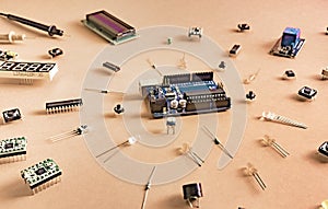 Micro electronics arduino DIY components on a light background, top view
