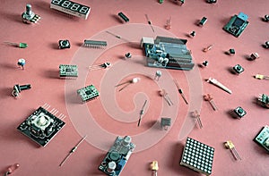 Micro electronics arduino DIY components on a light background, top view