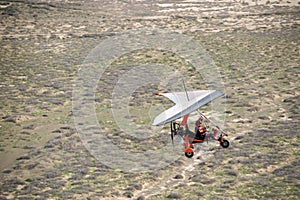 A micro-light plane flying over the Tankwa Karoo