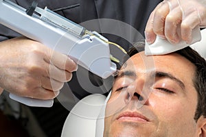 Micro needling technology used on middle aged man.