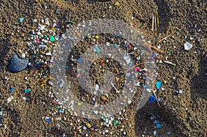 Micro plastics mixed in the sand of the beach