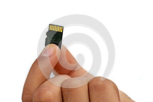 Micro SD Card holds in hand isolated on white background