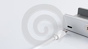Micro-USB Cable charger and USB Hub aluminum for Desktop, Computer, PC, Table Edge with adjustable clip, on white background, Copy