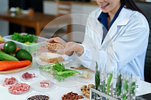 Microbiologists and nutrition experts analyze molecular samples in advanced food science labs