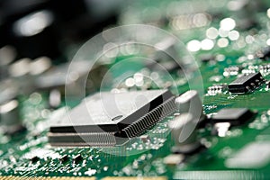 Microchip on green circuit board