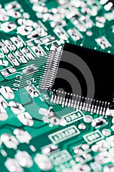 Microchip integrated on green motherboard