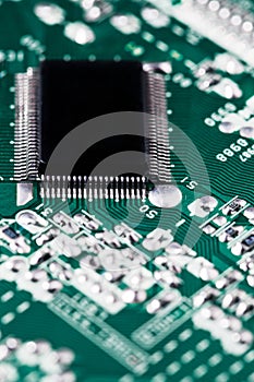 Microchip integrated on green motherboard computer science