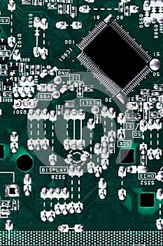 Microchip integrated on green motherboard computer science