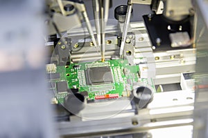 The microchip on the main board in the assembly line