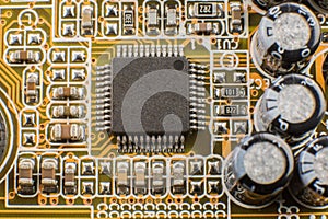 Microchip on the motherboard of the computer close macro.