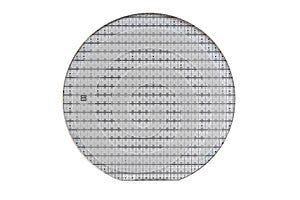 A microcircuit of a powerful Darlington transistor on a cut scribed semiconductor silicon multilayer wafer. Semiconductor chip is