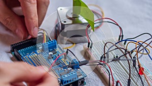 Microcontroller build closeup showing components, board and shield