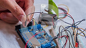 Microcontroller build closeup showing components, board and shield