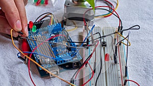 Microcontroller build closeup showing components, board and shield