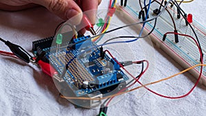 Microcontroller build closeup showing components, board and shield