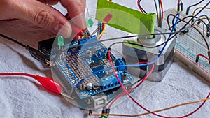 Microcontroller build closeup showing components, board and shield