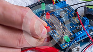 Microcontroller build closeup showing components, board and shield