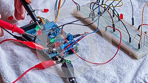 Microcontroller build closeup showing components, board and shield