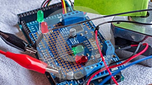 Microcontroller build closeup showing components, board and shield