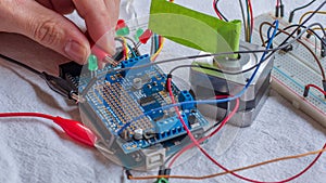 Microcontroller build closeup showing components, board and shield
