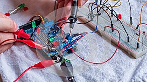 Microcontroller build closeup showing components, board and shield