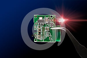 Microcontroller circuit board with infrared led light emitting diode electronic part closeup