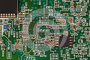 Microelectronic circuit with components board from digital device close up.