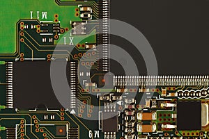 Microelectronic circuit with digital microchips board closeup.