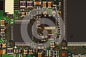 Microelectronic circuit with microchips board from digital device close up.