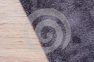 Microfiber Cloth on wooden background. Microfiber