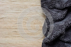 Microfiber Cloth on wooden background. Microfiber