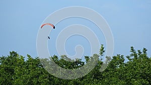 Microlight flying between the field and the sky, Lleida, Spain, Europe